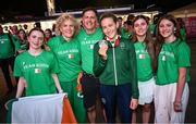 30 August 2024; Róisín Ní Riain of Ireland, third from right, celebrates with her family, from left, Saibh, mother Marian, father Seosamh O'Riain, Sorcha, Maedbh, and her silver medal in the Women's 100m Backstroke S13 Final on day two of the Paris 2024 Paralympic Games at La Défense Arena in Paris, France. Photo by Ramsey Cardy/Sportsfile