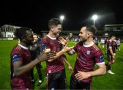 30 August 2024; Galway United players, from left, Jeannot Esua, Patrick Hickey and Greg Cunningham celebrate after the SSE Airtricity Men's Premier Division match between Galway United and Derry City at Eamonn Deacy Park in Galway. Photo by Stephen McCarthy/Sportsfile