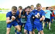 31 August 2024; Leinster players, from left, Harry Waters, Ryan Murphy and Alex Murgatroyd celebrate after their side's victory in the U18 Boys Club Interprovincial Round 3 match between Leinster and Ulster at Energia Park in Dublin. Photo by Tyler Miller/Sportsfile