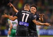 29 August 2024; Kiril Despodov, 77, is congratulated by his PAOK team-mate Taison, right, after scoring their side's second goal during the UEFA Europa League play-off second leg match between Shamrock Rovers and PAOK at Tallaght Stadium in Dublin. Photo by Stephen McCarthy/Sportsfile