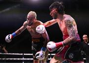 31 August 2024; Danny Aarons, right, in action against Danny Simpson in their light heavyweight bout during the Misfits Boxing & DAZN X Series at the 3Arena in Dublin. Photo by David Fitzgerald/Sportsfile