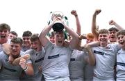 1 September 2024; Ulster captain Nathan Noble lifts the cup after their side's victory in the U18 Boys School's Interprovincial Round 3 match between Leinster and Ulster at Energia Park in Dublin. Photo by Shauna Clinton/Sportsfile