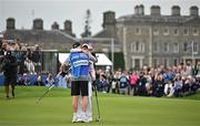 1 September 2024; Annabel Dimmock of England celebrates with her father and caddie Chris after winning the play-off in the final round of the KPMG Women’s Irish Open at Carton House Golf Club in Maynooth, Kildare. Photo by Sam Barnes/Sportsfile