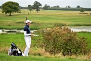 1 September 2024; Pauline Roussin-Bouchard of France checks her options before playing from the rough on the 18th fairway during the play-off in the final round of the KPMG Women’s Irish Open at Carton House Golf Club in Maynooth, Kildare. Photo by Sam Barnes/Sportsfile