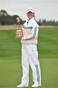 1 September 2024; Annabel Dimmock of England celebrates with the trophy after winning the KPMG Women’s Irish Open at Carton House Golf Club in Maynooth, Kildare. Photo by Sam Barnes/Sportsfile