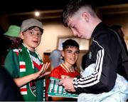 30 August 2024; Cathal O'Sullivan of Cork City signs autographs for supporters after the SSE Airtricity Men's First Division match between Cork City and Longford Town at Turner's Cross in Cork. Photo by Michael P Ryan/Sportsfile