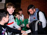 30 August 2024; Cork City manager Tim Clancy signs autographs for supporters after the SSE Airtricity Men's First Division match between Cork City and Longford Town at Turner's Cross in Cork. Photo by Michael P Ryan/Sportsfile