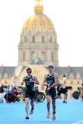 2 September 2024; Chloe MacCombe, left, and guide Catherine A Sands of Ireland in action during the women's PTVI race on day five of the Paris 2024 Paralympic Games at Pont Alexandre III in Paris, France. Photo by Ramsey Cardy/Sportsfile