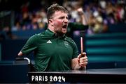 2 September 2024; Colin Judge of Ireland celebrates winning a point against Feng Panfeng of China during their men's singles MS11 round of 16 match on day five of the Paris 2024 Paralympic Games at South Paris Arena in Paris, France. Photo by Harry Murphy/Sportsfile