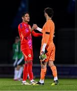 6 September 2024; Northern Ireland goalkeeper Pierce Charles, left, and England goalkeeper James Trafford after the UEFA European U21 Championship qualifier match between Northern Ireland and England at The Showgrounds in Ballymena, Antrim. Photo by Ben McShane/Sportsfile