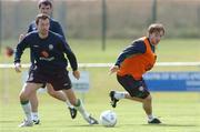 17 August 2004; David Connolly, Republic of Ireland, in action against team-mate Gary Breen during squad training. Malahide FC, Malahide, Co. Dublin. Picture credit; David Maher / SPORTSFILE