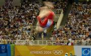 19 August 2004; Carly Patterson of the USA goes through her routine on the Beam on her way to winning Gold in the Women's Individual All Round Final in Artistic Gymnastics. Olympic Indoor Hall. Games of the XXVIII Olympiad, Athens Summer Olympics Games 2004, Athens, Greece. Picture credit; Brendan Moran / SPORTSFILE