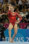 19 August 2004; Carly Patterson of the USA smiles as she finishes her routine on the Floor which clinched her the Gold medal ahead of Svetlana Khorkina of Russia in the Women's Individual All Round Final in Artistic Gymnastics. Olympic Indoor Hall. Games of the XXVIII Olympiad, Athens Summer Olympics Games 2004, Athens, Greece. Picture credit; Brendan Moran / SPORTSFILE