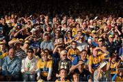 14 September 2013; Clare and Antrim supporters shield their eyes from the strong sunlight. Bord Gáis Energy GAA Hurling Under 21 All-Ireland 'A' Championship Final, Antrim v Clare, Semple Stadium, Thurles, Co. Tipperary. Picture credit: Ray McManus / SPORTSFILE