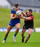 8 September 2024; Daithí McGowan of Ratoath in action against Padraig McKeever of Rathkenny during the Meath County Senior Club Football Championship Group D Round 3 match between Rathkenny and Ratoath at Páirc Tailteann in Navan, Meath. Photo by Ben McShane/Sportsfile