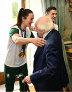 13 September 2024; The President of Ireland Michael D. Higgins greets Team Ireland boxer Kellie Harrington at the Team Ireland homecoming at Áras an Uachtaráin in Dublin. Photo by David Fitzgerald/Sportsfile