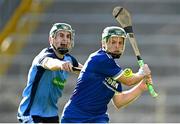 15 September 2024; Stephen Cahill of Thurles Sarsfield in action against Sam O'Farrell of Nenagh Éire Óg during the Tipperary Senior Hurling Championship Quarter-Final match between Thurles Sarsfields and Nenagh Eire Og at FBD Semple Stadium in Thurles, Tipperary. Photo by Tyler Miller/Sportsfile