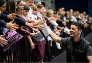 20 September 2024; Olympic gold medalist Rhys McClenaghan with school kids during a training session where Gymnastics Ireland are hosting the Northern European Championships 2024 at Sport Ireland National Indoor Arena in Dublin. Photo by David Fitzgerald/Sportsfile