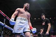 20 September 2024; Thomas Carty celebrates alongside trainer Packie Collins after defeating Jonatan Exequiel Vergara in their Heavyweight Bout during a Boxing from Dublin event at the 3Arena in Dublin. Photo by David Fitzgerald/Sportsfile