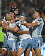 20 September 2024; Jamison Gibson-Park of Leinster, left, is congratulated by teammates James Ryan, Cian Healy and Garry Ringrose after scoring their side's fourth try during the United Rugby Championship match between Edinburgh and Leinster at Hive Stadium in Edinburgh, Scotland. Photo by Seb Daly/Sportsfile