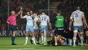 20 September 2024; Ross Byrne of Leinster, second from left, is shown a yellow card by referee Andrea Piardi during the United Rugby Championship match between Edinburgh and Leinster at Hive Stadium in Edinburgh, Scotland. Photo by Seb Daly/Sportsfile