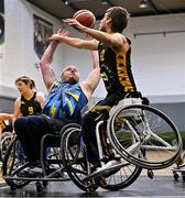 21 September 2024; Turlach Cotter of North East Thunder in action against Jonathan Hayes of Ballybrack Bulls during the Basketball Ireland Insuremyhouse.ie National Cup quarter-final match between Ballybrack Bulls and North East Thunder at the IWA Gym & Sports Hall in Clontarf, Dublin. The Irish Wheelchair Basketball 24/25 season began with 8 teams from across Ireland contesting the quarter-finals of the InsureMyHouse.ie National Cup and these will be followed by the opening round of the Wheelchair Basketball Junior Blitz on Sunday, featuring young players aged 5-17. Photo by Sam Barnes/Sportsfile