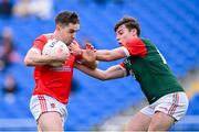 22 September 2024; David Murray of Pádraig Pearses in action against Pearse Frost of St Brigid's during the Roscommon Senior Club Football Championship quarter-final match between St Brigid's and Pádraig Pearses at Dr Hyde Park in Roscommon. Photo by Piaras Ó Mídheach/Sportsfile