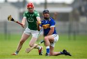 22 September 2024; Mark Carmody of Patrickswell is tackled by Phelim O'Reilly of Kilmallock during the Limerick County Senior Club Hurling Championship Group 1 match between Patrickswell and Kilmallock at Mick Neville Park in Rathkeale, Limerick. Photo by Tom Beary/Sportsfile