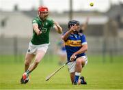 22 September 2024; Mark Carmody of Patrickswell is tackled by Phelim O'Reilly of Kilmallock during the Limerick County Senior Club Hurling Championship Group 1 match between Patrickswell and Kilmallock at Mick Neville Park in Rathkeale, Limerick. Photo by Tom Beary/Sportsfile