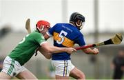 22 September 2024; Mark Carmody of Patrickswell is tackled by Phelim O'Reilly of Kilmallock during the Limerick County Senior Club Hurling Championship Group 1 match between Patrickswell and Kilmallock at Mick Neville Park in Rathkeale, Limerick. Photo by Tom Beary/Sportsfile