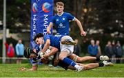 22 September 2024; David Crowley of Blackrock College scores his side's fourth try, despite the tackle of St Mary's College's Jack Halpin, during the JP Fanagan U20 semi-final match between St Mary's College and Blackrock College at Templeville Road in Dublin. Photo by Seb Daly/Sportsfile