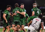 28 September 2024; Oisín Dowling of Connacht, 19, celebrates with team-mate Cathal Forde, right, after scoring their side's fourth try during the United Rugby Championship match between Connacht and Hollywoodbets Sharks at Dexcom Stadium in Galway. Photo by Tyler Miller/Sportsfile