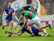 29 September 2024; Aidan McCormack of Thurles Sarsfields is tackled by Noel McGrath of Loughmore-Castleiney during the Tipperary County Senior Club Hurling Championship semi-final match between Loughmore Castleiney and Thurles Sarsfields at FBD Semple Stadium in Thurles, Tipperary. Photo by Michael P Ryan/Sportsfile