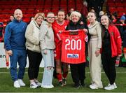 5 October 2024; Pearl Slattery of Shelbourne celebrates her 200th appearance with her family, from left to right, brother in law Patrick Moore, sister Samantha Moore, niece Tori Moore, mother Patricia McCann, and nieces Paige Moore and Maisie Moore after the SSE Airtricity Women's Premier Division match between Shelbourne and Peamount United at Tolka Park in Dublin. Photo by Thomas Flinkow/Sportsfile