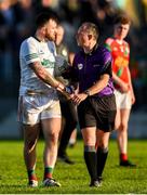 6 October 2024; Palatine goalkeeper Craig Kearney in conversation with referee John Hickey after the drawn Carlow County Senior Football Championship final match between Rathvilly and Palatine at Netwatch Cullen Park in Carlow. Photo by Tom Beary/Sportsfile