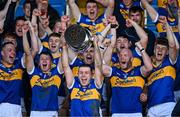 6 October 2024; Clough-Ballycolla captain Aidan Corby, alongside teammates, from left, Stephen Maher, Kevin Mulhall, Darren Maher and Joseph Pearson, celebrate with the cup after victory in the Laois County Senior Club Hurling Championship final match between Clough-Ballycolla and Rathdowney-Errill at Laois Hire O'Moore Park in Portlaoise, Laois. Photo by Brendan Moran/Sportsfile