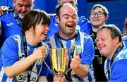 6 October 2024; Finn Harps FC players, from left, Anna Hennessy, Shaun McCusker and Hughy Sweeney share a joke after their side's victory in the FAI League of Ireland Down Syndrome Festival at the National Indoor Arena Futsal Courts in Dublin. Photo by Shauna Clinton/Sportsfile