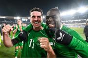 10 October 2024; Robbie Brady, left, and Festy Ebosele of Republic of Ireland celebrate after the UEFA Nations League B Group 2 match between Finland and Republic of Ireland at the Helsinki Olympic Stadium in Helsinki, Finland. Photo by Stephen McCarthy/Sportsfile