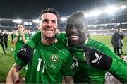 10 October 2024; Robbie Brady, left, and Festy Ebosele of Republic of Ireland celebrate after the UEFA Nations League B Group 2 match between Finland and Republic of Ireland at the Helsinki Olympic Stadium in Helsinki, Finland. Photo by Stephen McCarthy/Sportsfile