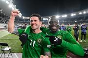 10 October 2024; Robbie Brady, left, and Festy Ebosele of Republic of Ireland celebrate after the UEFA Nations League B Group 2 match between Finland and Republic of Ireland at the Helsinki Olympic Stadium in Helsinki, Finland. Photo by Stephen McCarthy/Sportsfile