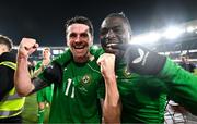 10 October 2024; Robbie Brady, left, and Festy Ebosele of Republic of Ireland celebrate after the UEFA Nations League B Group 2 match between Finland and Republic of Ireland at the Helsinki Olympic Stadium in Helsinki, Finland. Photo by Stephen McCarthy/Sportsfile