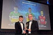 11 October 2024; Offaly hurler Charlie Mitchell receives his 2024 Joe McDonagh Team of the Year award from Uachtarán Chumann Lúthchleas Gael Jarlath Burns during the GAA Champion 15 Awards ceremony at Croke Park in Dublin. Photo by Sam Barnes/Sportsfile