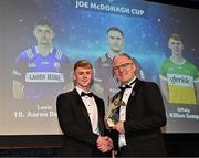 11 October 2024; Offaly hurler Killian Sampson receives his 2024 Joe McDonagh Team of the Year award from Uachtarán Chumann Lúthchleas Gael Jarlath Burns during the GAA Champion 15 Awards ceremony at Croke Park in Dublin. Photo by Sam Barnes/Sportsfile