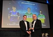 11 October 2024; Offaly hurler Ciarán Burke receives his 2024 Joe McDonagh Team of the Year award from Uachtarán Chumann Lúthchleas Gael Jarlath Burns during the GAA Champion 15 Awards ceremony at Croke Park in Dublin. Photo by Sam Barnes/Sportsfile