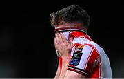 11 October 2024; Ben Doherty of Derry City reacts after picking up an injury during the SSE Airtricity Men's Premier Division match between Derry City and Bohemians at The Ryan McBride Brandywell Stadium in Derry. Photo by Ramsey Cardy/Sportsfile