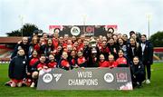 13 October 2024; The Shelbourne team and staff celebrate with the cup and academy players after the EA SPORTS WU19 Cup match between Shelbourne and Athlone Town at Tolka Park in Dublin. Photo by Tyler Miller/Sportsfile