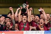 13 October 2024; Portarlington captain Ronan Coffey lifts the cup after the Laois County Senior Club Football Championship final match between Portlaoise and Portarlington at Laois Hire O'Moore Park in Portlaoise, Laois. Photo by Tom Beary/Sportsfile