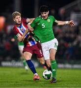 11 October 2024; Anselmo Garcia-MacNulty of Republic of Ireland in action against Sindre Walle Egeli of Norway during the UEFA European U21 Championship qualifier match between Republic of Ireland and Norway at Turner's Cross in Cork. Photo by Ben McShane/Sportsfile