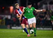 11 October 2024; Anselmo Garcia-MacNulty of Republic of Ireland in action against Sindre Walle Egeli of Norway during the UEFA European U21 Championship qualifier match between Republic of Ireland and Norway at Turner's Cross in Cork. Photo by Ben McShane/Sportsfile