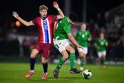 11 October 2024; Anselmo Garcia-MacNulty of Republic of Ireland in action against Sindre Walle Egeli of Norway during the UEFA European U21 Championship qualifier match between Republic of Ireland and Norway at Turner's Cross in Cork. Photo by Ben McShane/Sportsfile